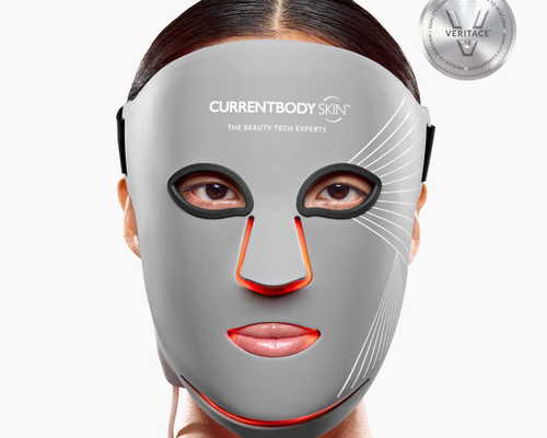 Model wearing the CurrentBody Skin LED Multi-Light Mask face on