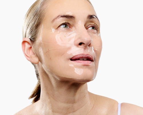 Woman wearing the CurrentBody Skin Hydrogel Face Mask